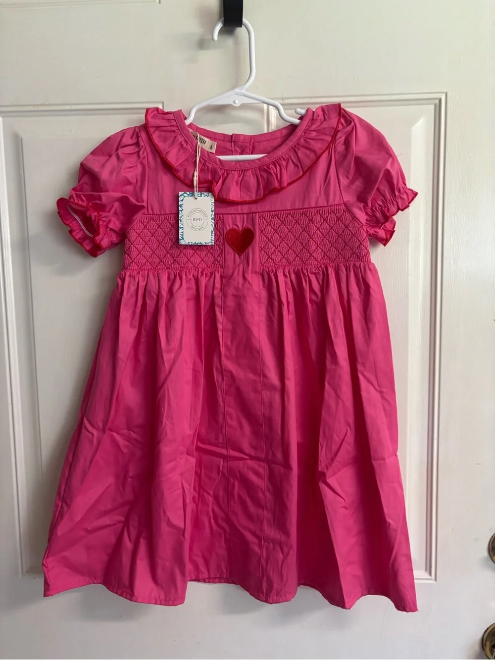 NWT size 6 Rylee Faith hot pink, embroidered heart smocked short sleeve Dress .
